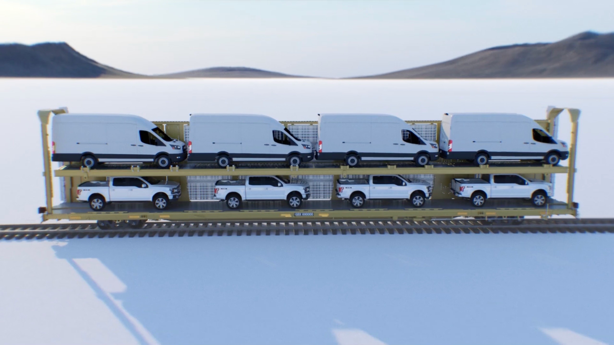 Railcar on railroad track showing loaded vehicles loaded for transport